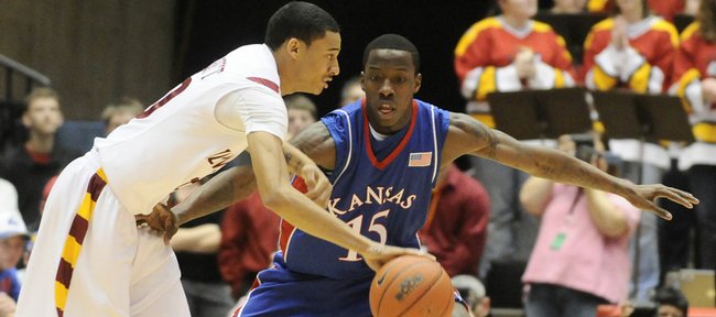 Kansas guard Tyshawn Taylor defends Iowa State guard Diante Garrett during the first half of the Jayhawks game Jan. 24 at Hilton Coliseum in Ames, Iowa.