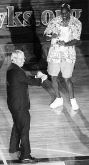 Former KU coach Roy Williams, left, showed Kenny Gregory how to dance during 1998s Late Night.