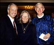 Kansas University basketball coach Roy Williams and his wife,
Wanda, join Bob Billings during a January 2002 event to honor
Billings and his many contributions to KU. The event was at KU's
Adams Alumni Center.
